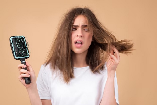 Hair loss woman with a comb and problem hair hairloss and bald problems concept 